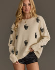 Ivory Skull Sweater