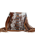 Flouncy- Tan Cowhide with Fringe and Concho Detail