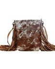 Flouncy- Tan Cowhide with Fringe and Concho Detail