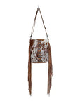 Flouncy- Tan Cowhide with Fringe and Concho Detail