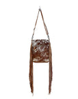 Flouncy- Tan Cowhide with Fringe and Concho Detail